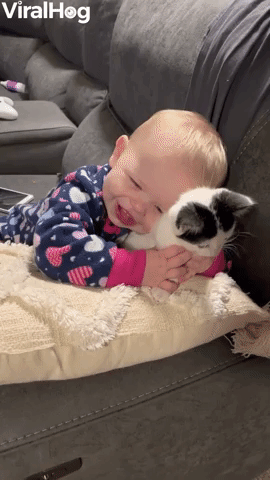 Baby Loves Her New Kitten
