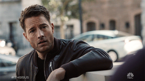 TV gif. Justin Hartley as Kevin Pearson on This Is Us, raising his eyebrows and pointing at himself.