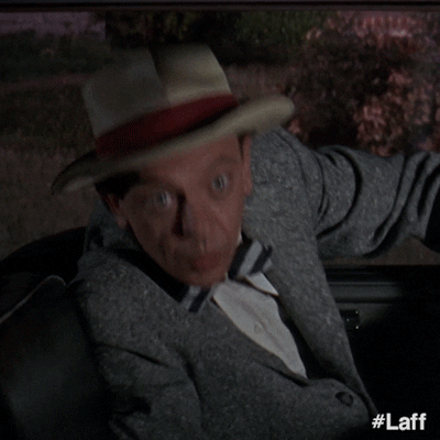 Movie gif. Don Knotts as Luther Heggs in The Ghost and Mr. Chicken sits in a car. He looks over and is in utter shock. He gasps and his eyes look like they're popping out. 