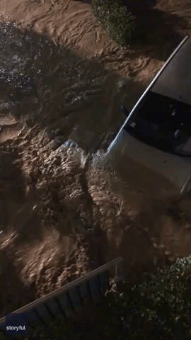 Floodwater Sweeps Car Along Amid Deadly Flooding in Italy