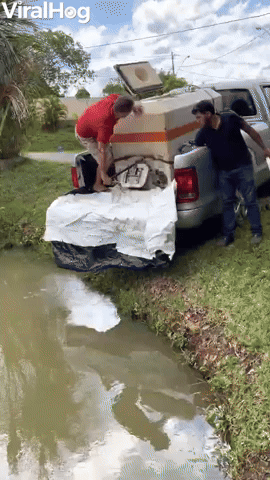 Man Slips and Falls While Stocking Pond With Fish