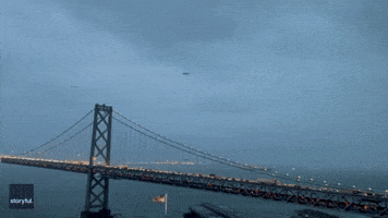 Picturesque San Francisco Moment Captured as Crows Dive Through Cloudy Evening Sky