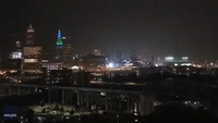 Lightning Illuminates Downtown Cleveland Skyline Amid Tornado-Warned Storm