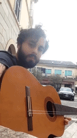 Man Stuck With Two Stringed Guitar Creates Original Composition