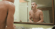 ProTriathletesOrg huh mirror triathlon eyebrow raise GIF