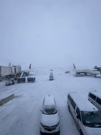 Snow Blankets Minneapolis Airport Ahead of Christmas