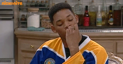 TV gif. Will Smith as himself in Fresh Prince of Bel Air very aggressively bites his nails, one finger at a time, and he seems extremely nervous about something.