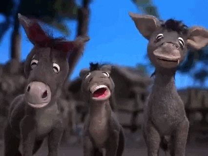 Stop motion gif. Scene of three donkeys from Nestor the Long-Eared Christmas Donkey, bobbing their heads and laughing.