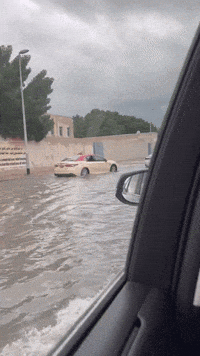 'Everywhere's a River': Traffic Crawls Through Floodwater During Dubai Deluge