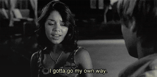 A black and white GIF of a couple letting go of each other's hand. Text on the screen reads, "I gotta go my own way."