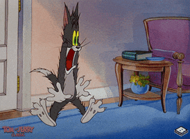 Cartoon gif. Jerry on Tom and Jerry shakes in terror as his limbs stay stiff and his eyes bug out. 