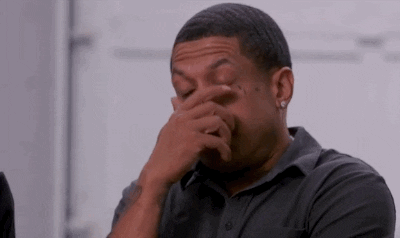 Reality TV gif. Stevie J from Love and Hip Hop: Atlanta shoves his face in his hand and shakes, looking incredibly disappointed.