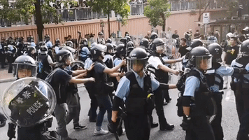 Police Intervene as Protesters Demonstrate Against Parallel Trading in Hong Kong