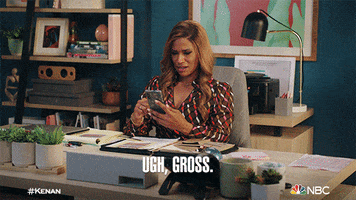TV gif. Kimrie Lewis as Mika in Kenan. She's sitting in her office and looking at her phone. She scrolls down and peers closer before scrunching her face and saying, "Ugh, gross."