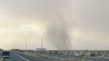 Storm Chaser Accelerates Straight Into Dust Devil