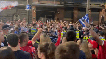 Police Use Pepper Spray as Crowd Surrounds Car Outside Djokovic Lawyers' Office