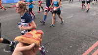Well-Wisher Shares His Pizza With Runners at London Marathon