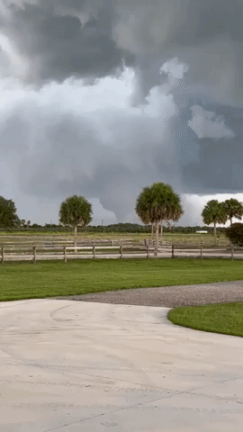 Funnel Cloud Spirals Down During Tornado-Warned Storm Near Fort Pierce, Florida