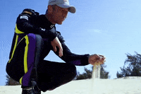 ExtremeELive beach thinking sand xe GIF