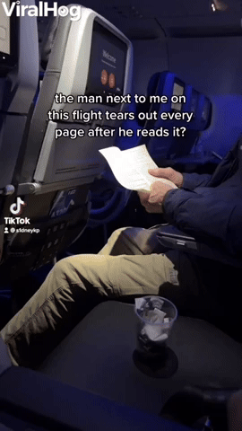 Guy on Flight Rips Pages From Book After Reading