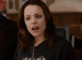Movie gif. Rachel McAdams as Amy in The Family Stone signs "I, love, you."