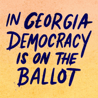 Text gif. Handwritten capitalized text against peach and yellow background reads, “In Georgia democracy is on the ballot.” A hand holding a can of blue spray paint underlines the word, “Georgia.”