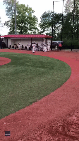 High School Baseball Teams Celebrate as Student With Mobility Impediment Makes a Base Hit