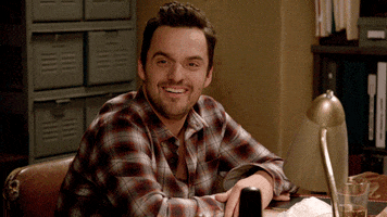 TV gif. Jake Johnson as Nick in New Girl gags as if grossed out. 