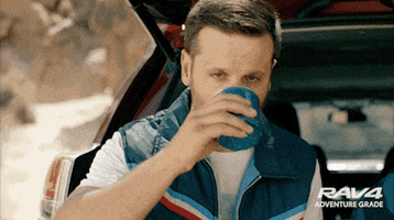 Ad gif. Man leans on the open back hatch of a Toyota Rav-4, sipping a mug of coffee and promptly spitting it back into the cup as the word "nope" pops up to the side.