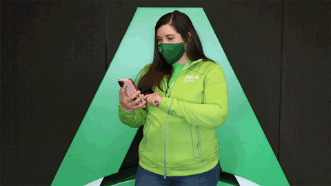 Phone Reaction GIF by Seattle-Tacoma International Airport