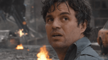 Movie gif. Mark Ruffalo as the Hulk in Avengers. He looks back at us and tosses us a dry look as he exhaustedly says, "I'm always hungry."