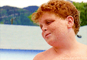 Movie gif. Patrick Renna as Hamilton 'Ham' in Sandlot blows a kiss in slow motion and waves dramatically with longing eyes.