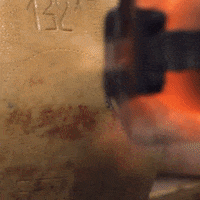 ParmigianoReggiano hot fire cheese branding GIF