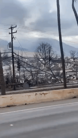 'Heartbroken' Visitors Survey Burned-Out Buildings and Vehicles After Deadly Lahaina Wildfire