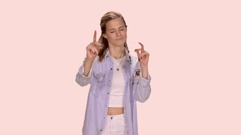 Celebrity gif. Molly Kate Kestner points at us with both hands and says, “You got this!”