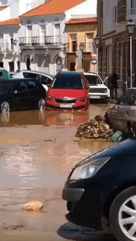 Cars Pile Up in Streets of Spanish Town in Wake of Flash Flood