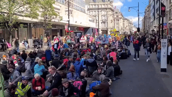 Extinction Rebellion Protesters Demand End to Fossil Fuel Investments in Central London