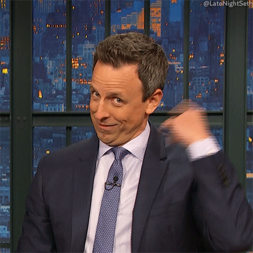 TV gif. Seth Meyers as host of Late Night tilts his head down skeptically and does the cuckoo sign, twirling his finger in circles around his ear.