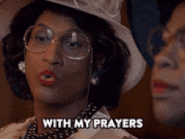 TV gif. Keegan-Michael Key and Jordan Peele in Key and Peele. They're dressed up as church ladies and Key turns to Peel to say matter-of-factly, "With my prayers."  Peele responds with pursed lips and a nod of agreement.