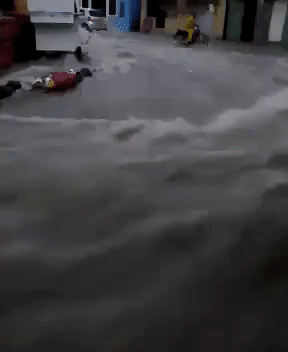 Torrent of Water Reported in La Romana Street as Matthew's Effects Are Felt