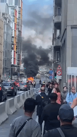 Car Blazes in Traffic Near European Parliament in Brussels