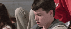 Movie gif. In a scene from Ferris Bueller's Day Off, Matthew Broderick as Ferris turns to us with a worried look and shows his teeth as if to say "yikes."