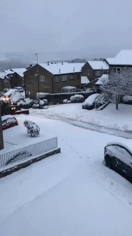 Snow Plow Gets to Work in Sheffield, to Disappointment of Would-Be Sledders