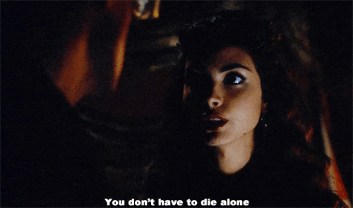 TV gif. Morena Baccarin as Inara Serra in Firefly, gazes up to a man in a dark room. Her wide, dark eyes focused on him. Text, "You don't have to die alone."