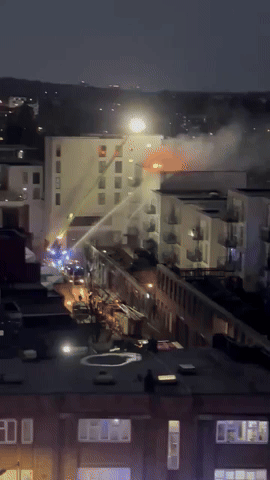 Crews Douse Fire at London Apartment Building