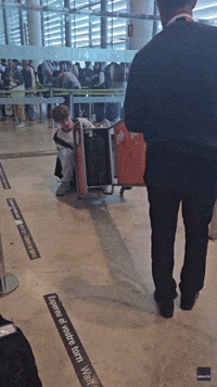 Passenger's Bag Proves Just Too Snug a Fit 
