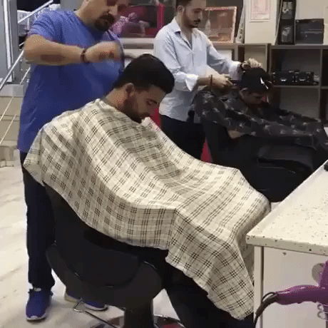 barber scream prank GIF