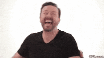 Celebrity gif. Ricky Gervais throws his head back and laughs uncontrollably. 