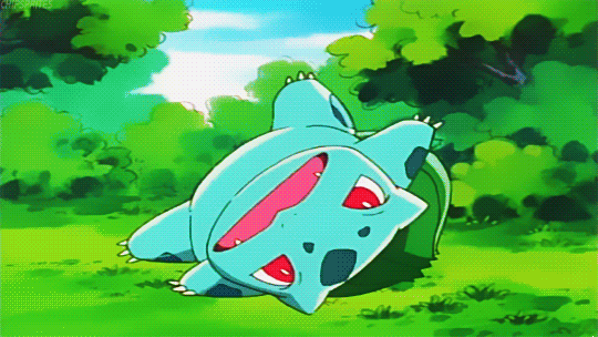 Pokémon gif. Bulbasaur is flopped on his back like a turtle that can't get up. He lays super still with his arms spread out in shock. A pokeball is thrown at him and it opens up, beaming him instead.