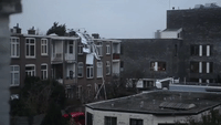Solar Panels Crash Off Hague Rooftop During Deadly Storm